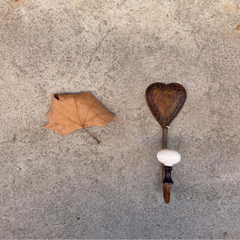 Vintage. Rustic Metal and White Porcelain Heart Hook